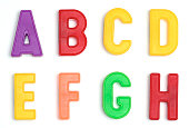 Colored plastic letters A through H