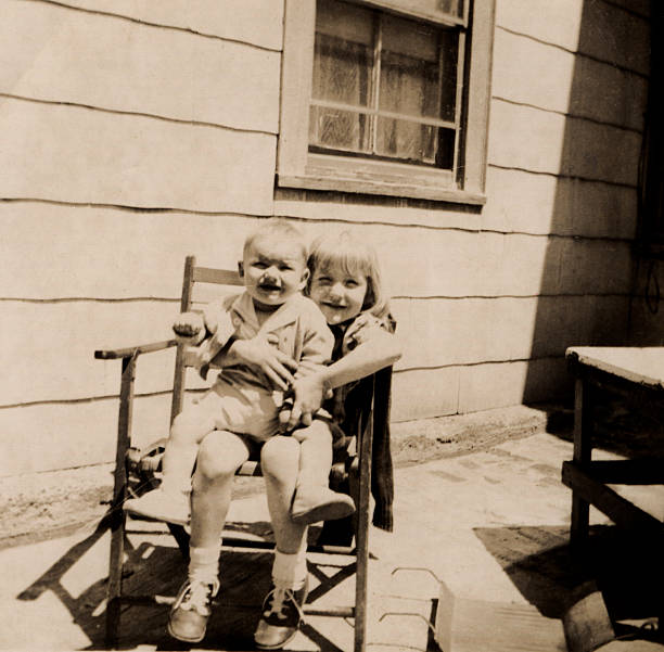 Two Kids in Rocker stock photo