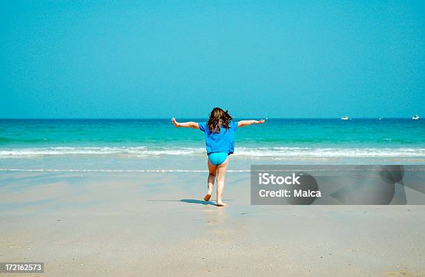 Freedom Stock Photo - Download Image Now - Arms Outstretched, Barefoot, Beach