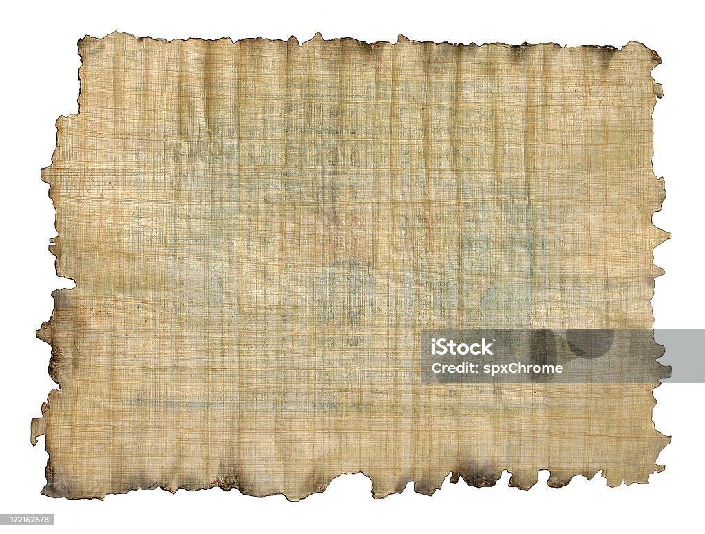 Papyrus Paper This is handmade papyrus paper from Eygpt. The paper has a corn like texture and makes an excellent background for any design project. This particular piece also has burned edges and is isolated on white background. Papyrus Paper Stock Photo