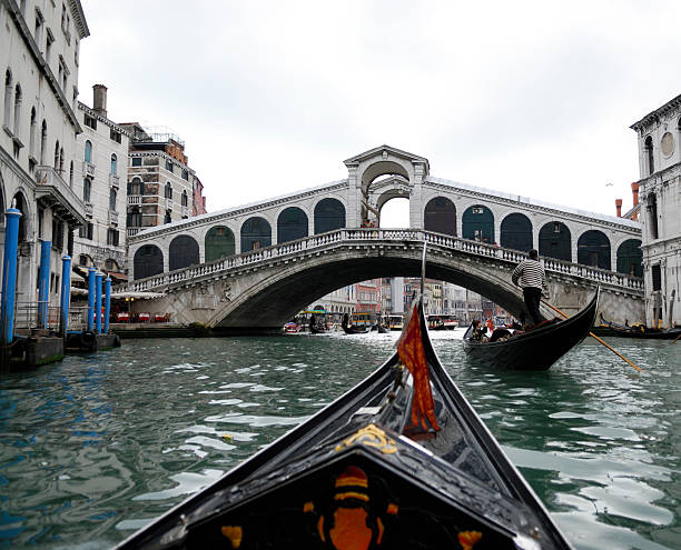 View of Rialto bridge from a gondola ride on the Grand Canal.