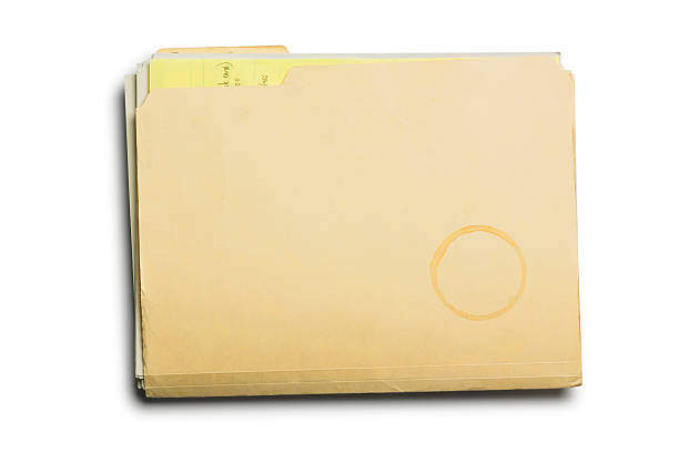 manila folder & coffe stain - akte envelop stockfoto's en -beelden