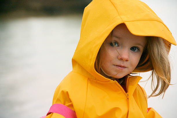 istock Little Girl in Yellow Rain Jacket 172164055