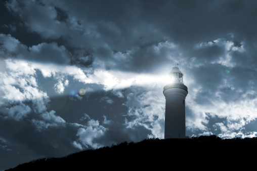 Cloudy day on the sea, sunlights shines between cloud, and a little island in the distances, in Keelung, Taiwan.