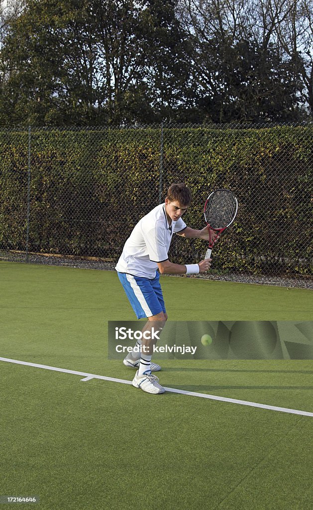 Partita di tennis all'aperto - Foto stock royalty-free di Adolescente