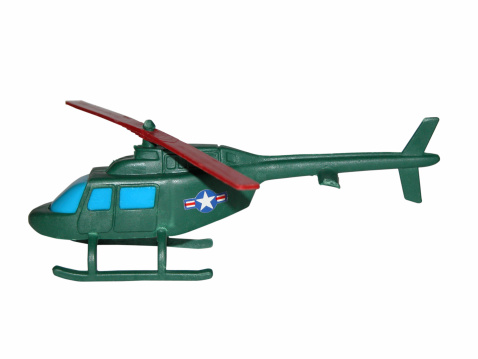 Plastic toy helicopter with a path.