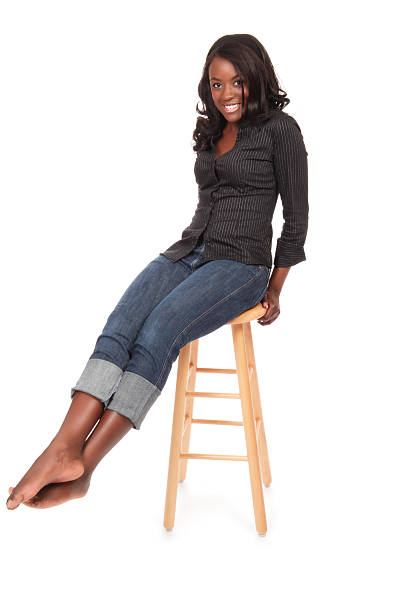 istock Attractive Young Woman on Stool 172165125