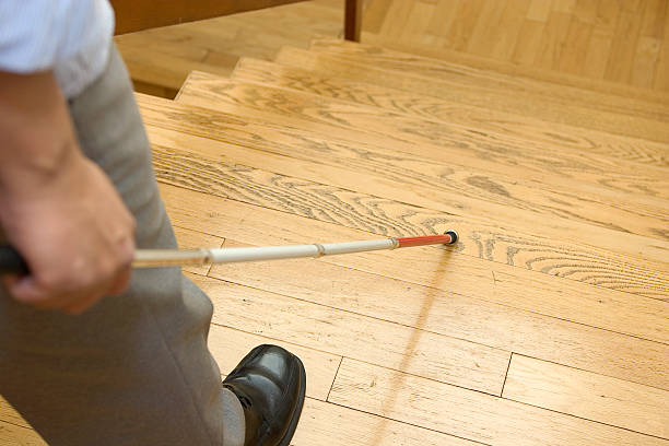 istock Image of blind man with walking stick about to go downstairs 172165148