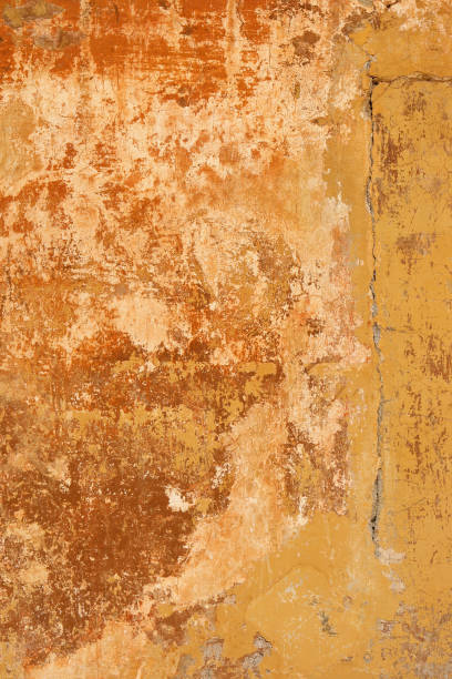 istock Red yellow Roman grunge wall texture with a crack 172165179