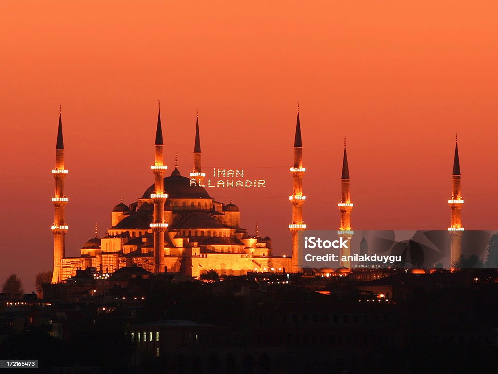 Sultanahmet mosque Fatih mosque in istanbul during fasting . The Mosque  is illuminated specially for fasting and it says worship to Allah.Camera Body : Canon 350DLens : Sigma 70-300 mm APO Fasting - Activity Stock Photo