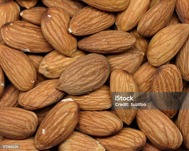 Almonds Stock Photo - Download Image Now - Almond, Backgrounds, Brown