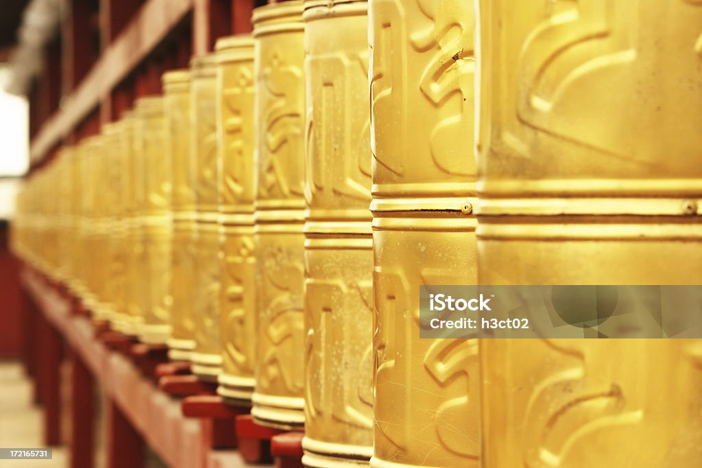 Prayer Wheels "Traditional buddhist prayer wheels - Splendid China, Shenzhen" Buddhism Stock Photo