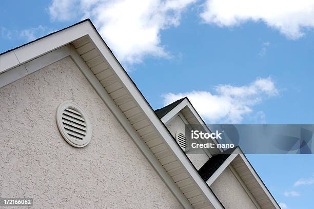 Close Up Of Roof Peaks Against Blue Sky Stock Photo - Download Image Now - Air Duct, Rooftop, House