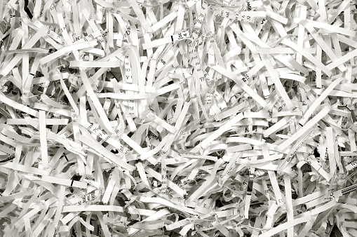 Cross-cut shredded paper