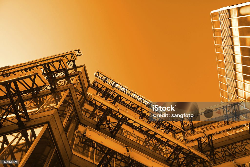Modern Structure orange glow building - lots of room for print copy Architecture Stock Photo