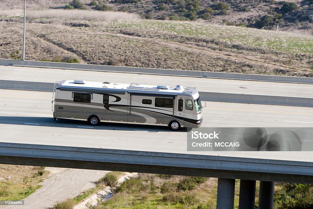 Vacation Time A luxury motor home on a road trip. Motor Home Stock Photo