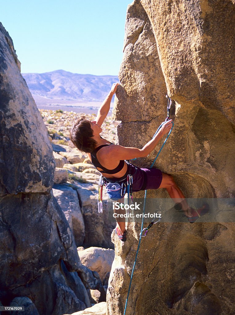 Femminile Rock Climber - Foto stock royalty-free di Abilità
