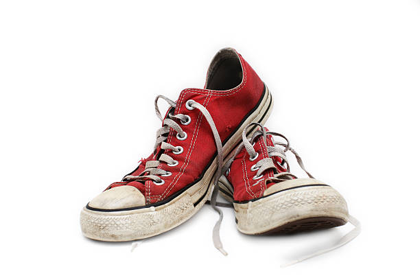 Sneakers A pair of old sneakers. pair of shoes stock pictures, royalty-free photos & images