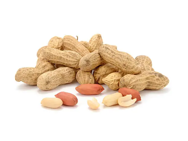 Photo of A pile of peanuts on a white background