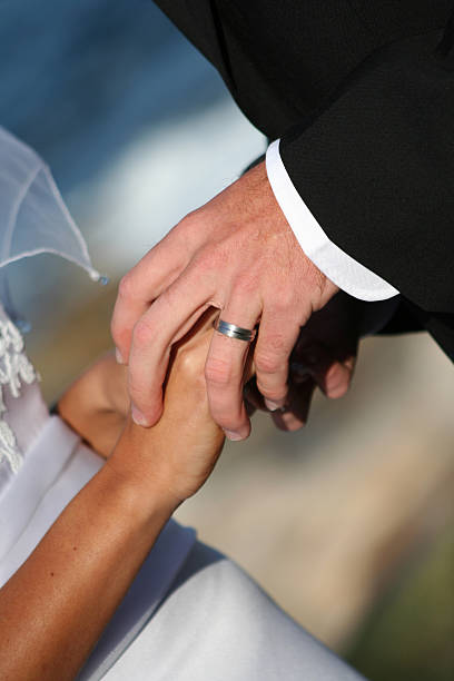 istock Bride and Groom Holding hands 172167618