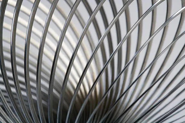 Close up of slinky Abstract metal spiral