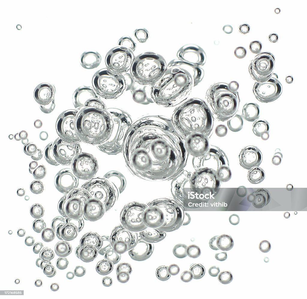 Rising burbujas aisladas en blanco - Foto de stock de Abstracto libre de derechos