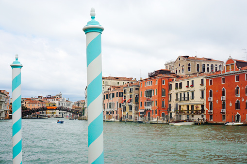 Striped mooring poles on the Grand Canal in Venice