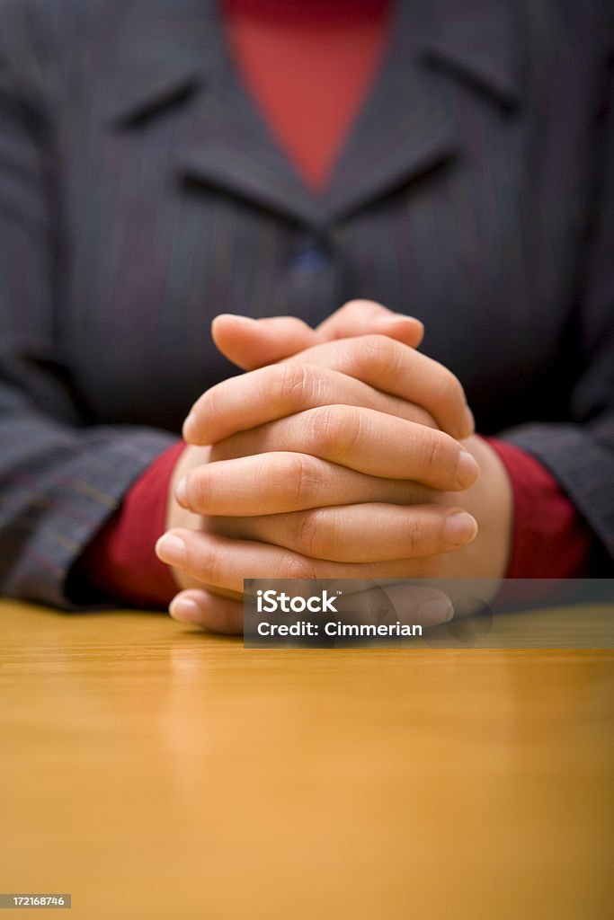 Business hands Businesswoman's hands at the polished meeting table. Space for text. Business Person Stock Photo
