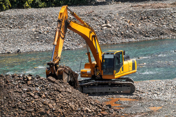 istock The excavator is working on expanding the riverbed. 1721692376