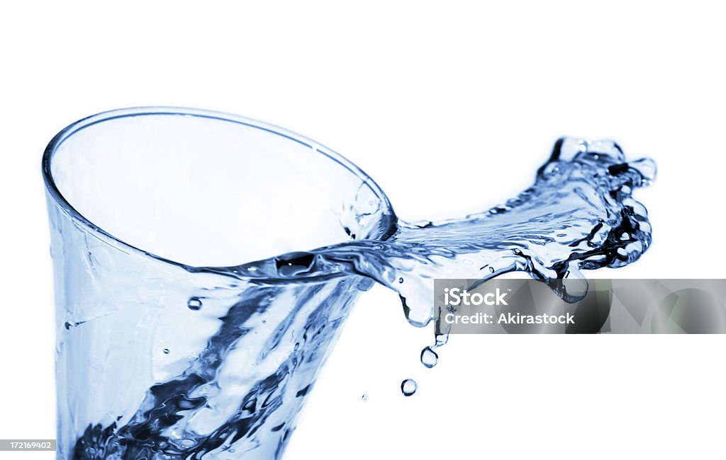 Water splash Water splash at the top of a glass. Water Stock Photo