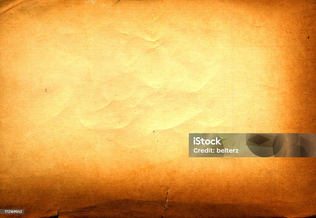 Golden paper texture old worn and torn golden paper texture background Ancient Stock Photo