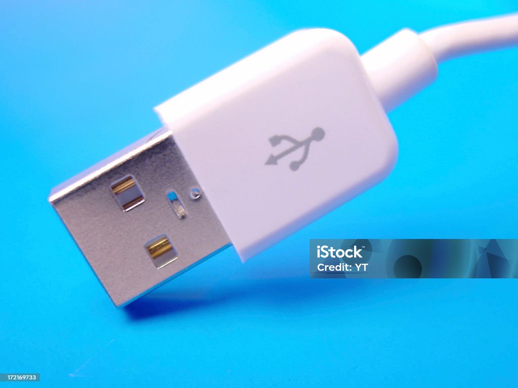 cable USB en azul - Foto de stock de Cable USB libre de derechos