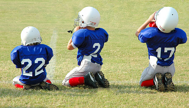Three Football Players