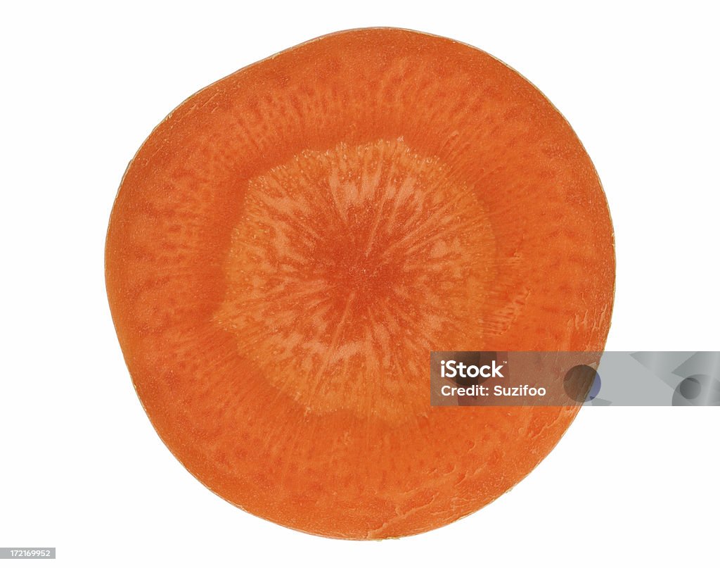 carrot cross section "A slice of carrot, isolated on white." Carrot Stock Photo