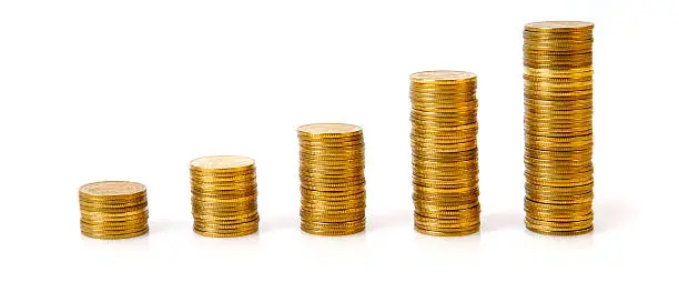 Photo of Business graph made of coins on a white background