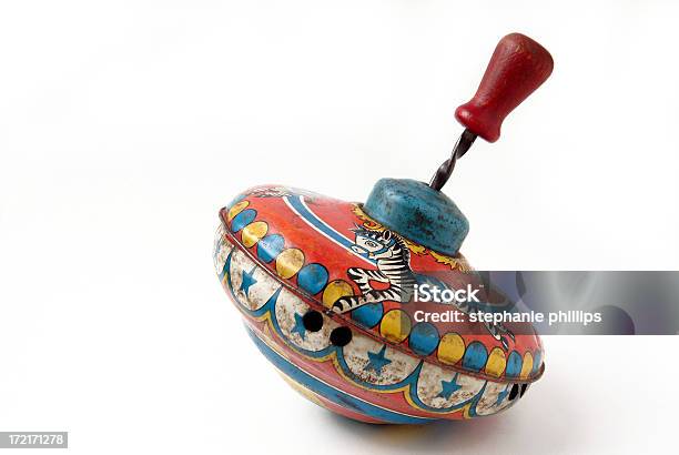 Antique Brightly Painted Metal Childs Toy Spinning Top Stock Photo - Download Image Now