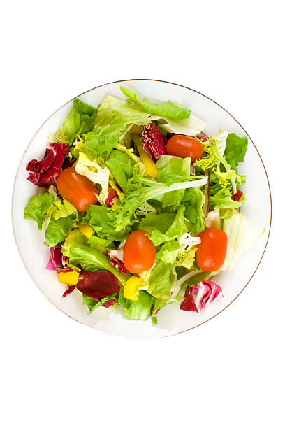 Italian side salad plan view no dressing A plan view of an Italian side salad.Italian Side Salad: side salad stock pictures, royalty-free photos & images