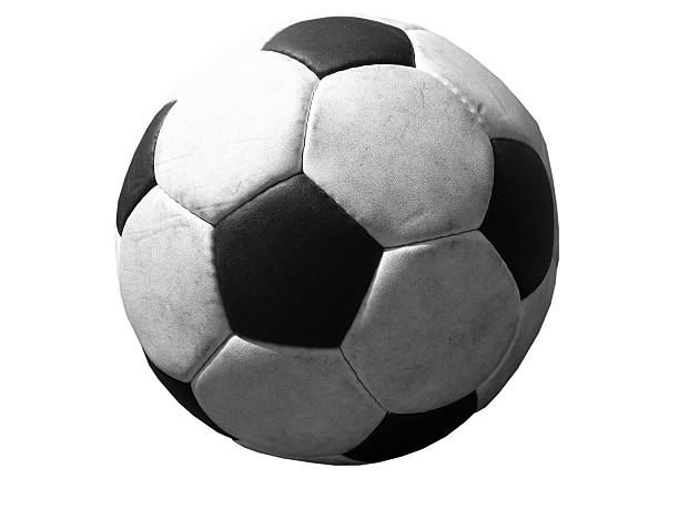 footballs falling on plain background