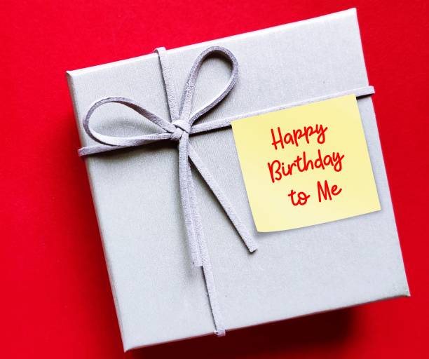 istock Gift box on copy space red background with handwritten note HAPPY BIRTHDAY TO ME, concept of give birthday present to yourself, wish yourself happy birthday messages in the most special day of the year 1721717022