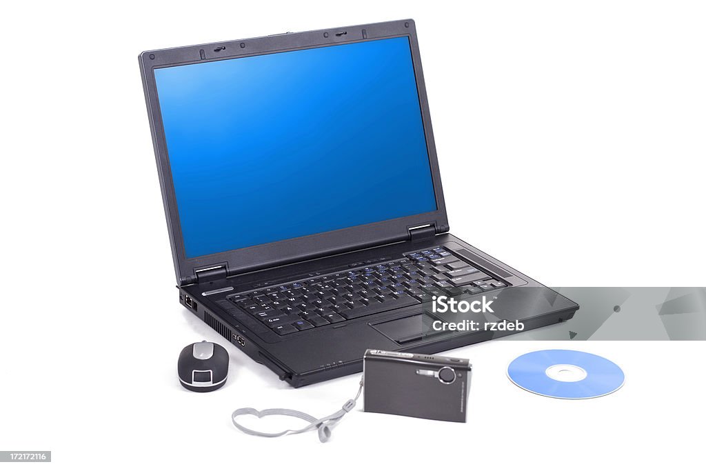 Digital photography - laptop, camera and cd "Digital photography - laptop, camera and cd" Computer Stock Photo