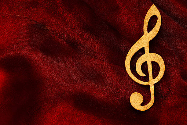 A blank music sheet with treble clef... close-up with copy space.