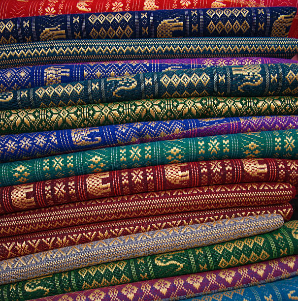 Cambodia: embroidered silk for sale in Siem Reap Cambodia: embroidered silk for sale in Siem Reap, the town closest to Angkor Wat khmer stock pictures, royalty-free photos & images