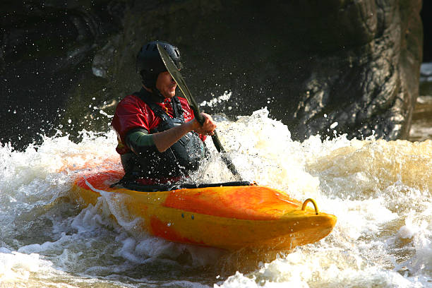 naranja y amarillo - kayaking white water atlanta river nature fotografías e imágenes de stock