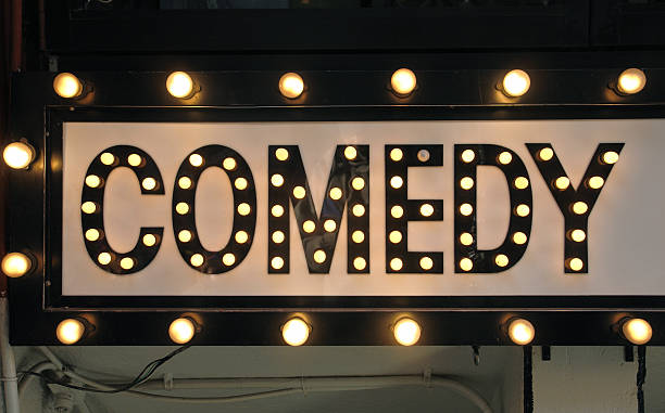 comedy in lights sign stock photo