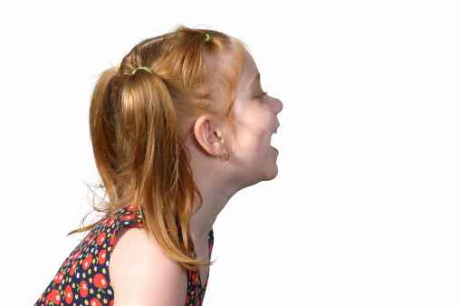 Laughing little girl (profile).