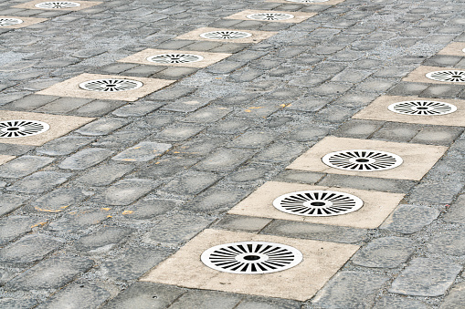 Drainage ditch, sewer iron cover