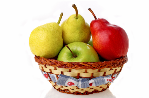 Closeup Image Of Tasty Fruits In Wooden Basket. Background White