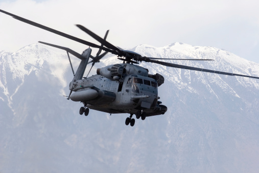 San Diego, USA - 04.10.2009: US Army Boeing CH46 transport helicopter formation landing in the combat area bringing support troops