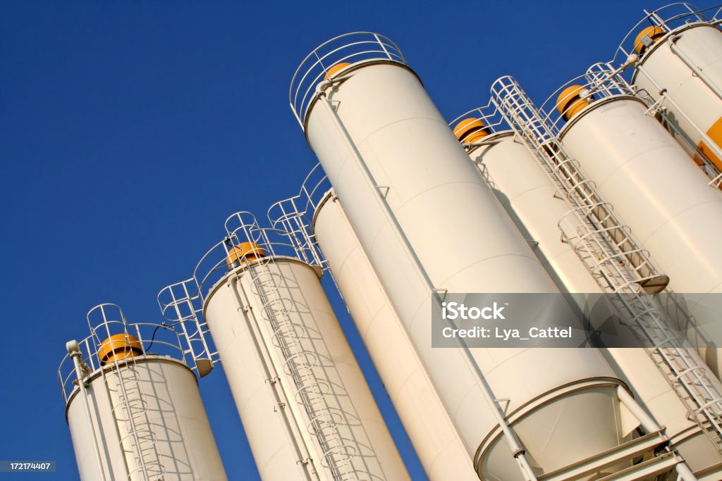 White silos # 2 "White silos in industrial area, please see also my other images of silo's in my lightbox:" Liquid Stock Photo