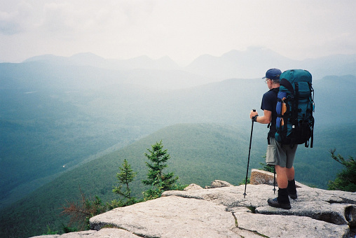 A backpacker views mountains to be travelled in New Hampshire on his 3500 km. (6 month) journey along the Appalachian Trail in the eastern United States, a marked footpath from Maine to Georgia through the Appalachian mountain range.
